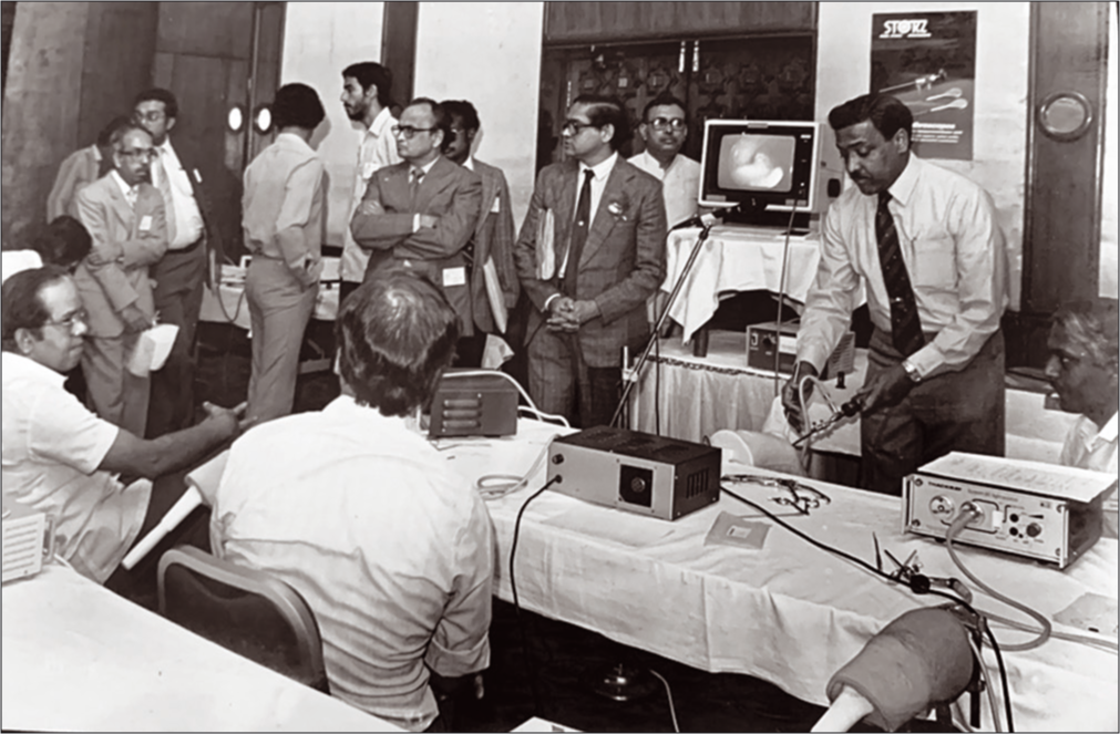 Dr. Gopalkrishnan demonstrating knee arthroscopy at an instructional course in 1988 in Madras. In the background is Dr. Sriram and Dr. Vora.