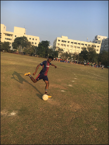 Picture of a young footballer successfully returning to sport after undergoing anterior cruciate ligament reconstruction with lateral extra-articular tenodesis.